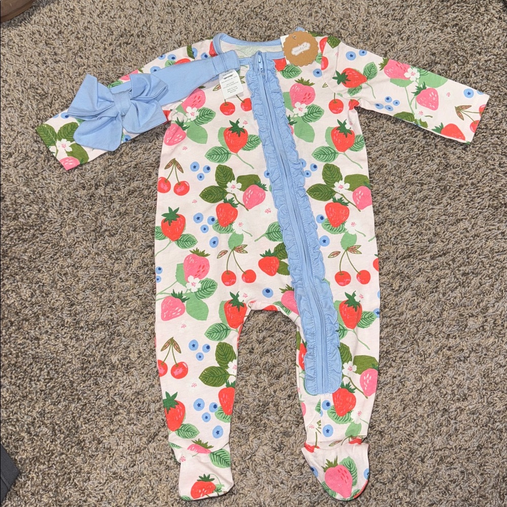 Mud Pie Baby Onesie with Fruit print. Headband included